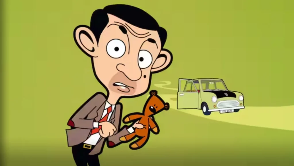 Teddy を抱えて驚く Mr. Bean